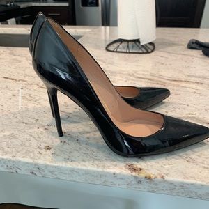 Stuart Weitzman black patent leather pumps